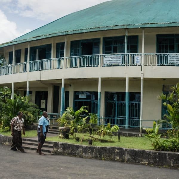 Office building in Fiji with tropical landscaping.