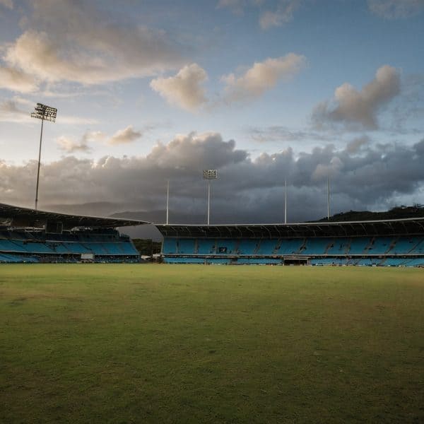 Fiji cricket stadium under a cloudy sky during sunset, showcasing a vibrant sports venue in Fiji.